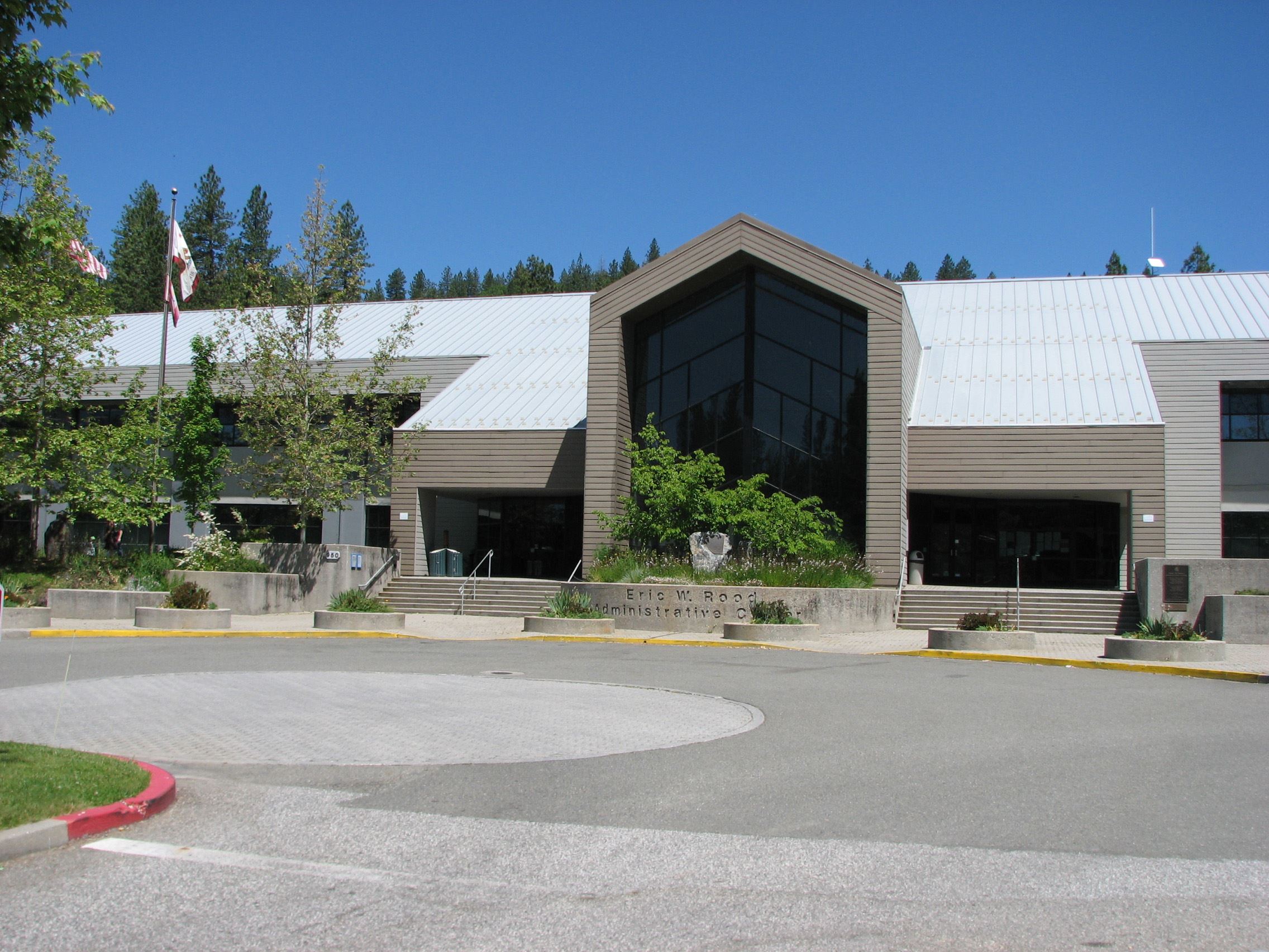 Eric Rood one story building Front and parking lot