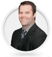 Nicholas Ready-Child Welfare Services Program Manager-in a suit smiling