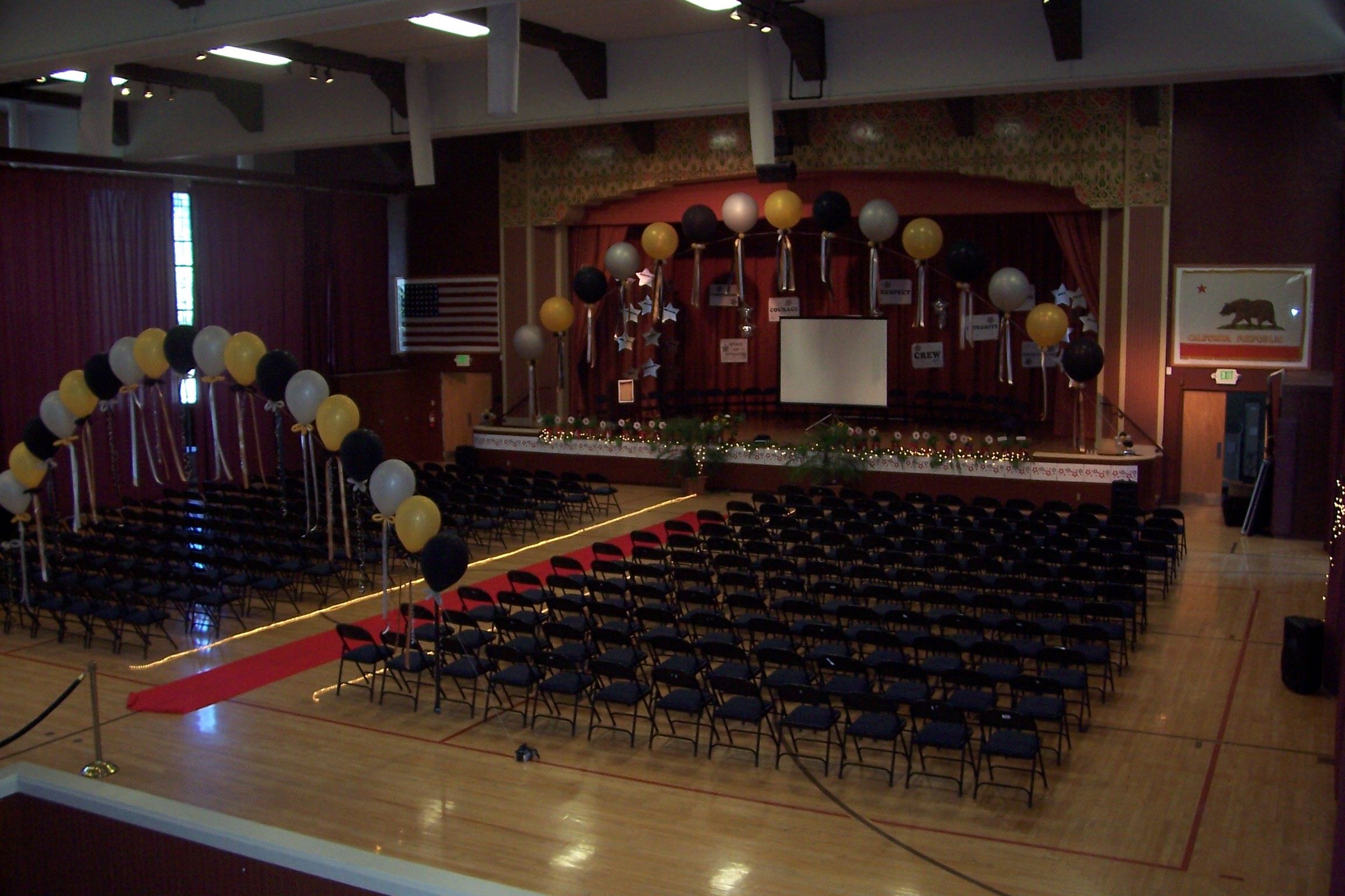Graduation Decorations and chair arrangement in Auditorium at Grass Valley Veteran Memorial Building