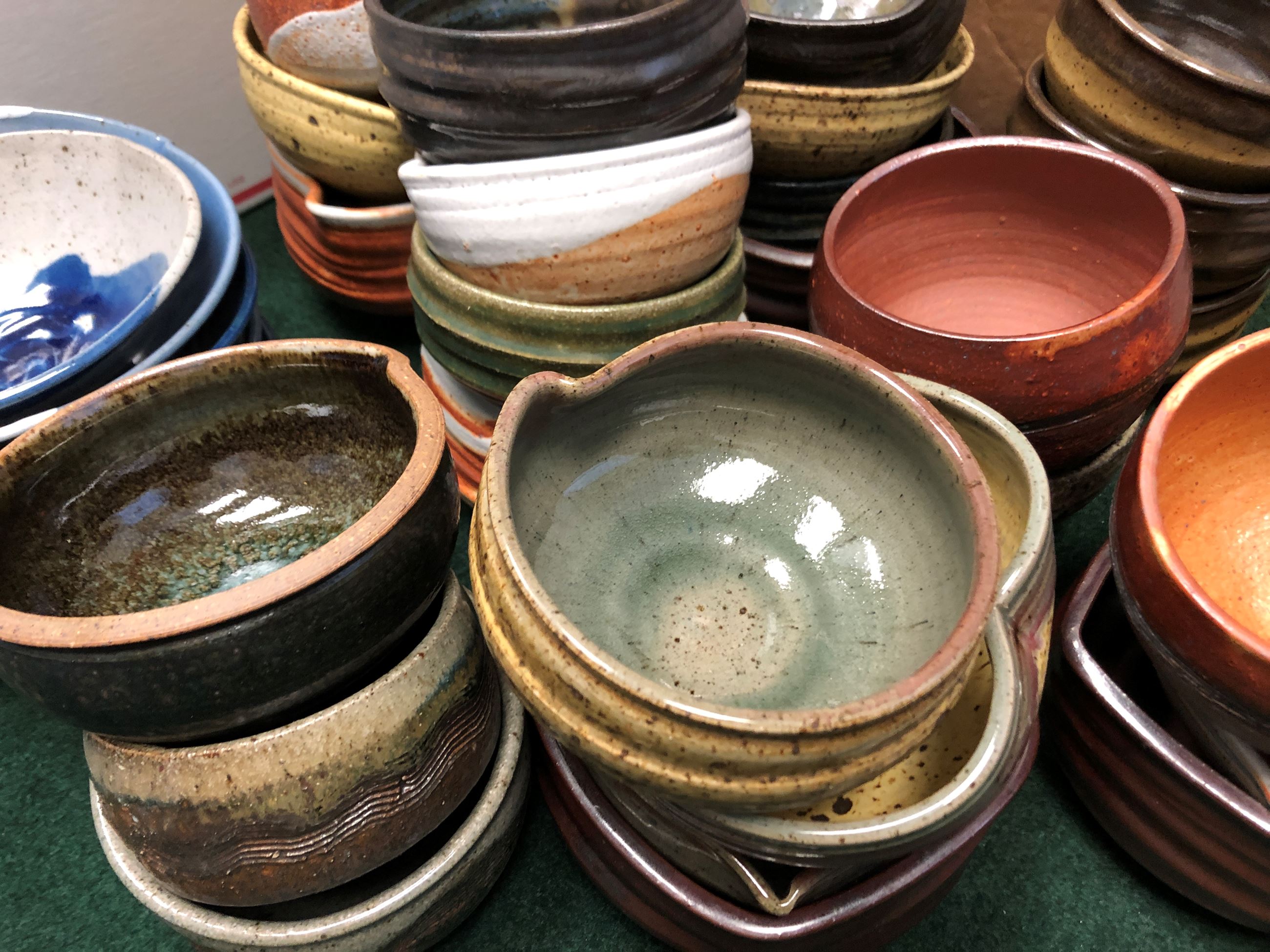 Dozens of empty bowls, waiting to be filled.