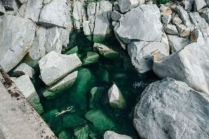 Beautiful Yuba River emerald swimming hole surrounded by granite