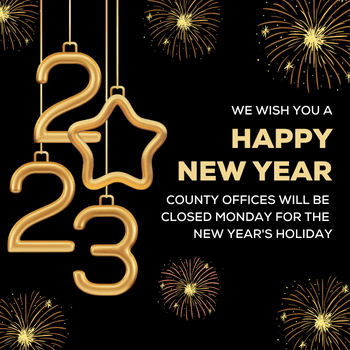 Golden fireworks burst on a black background. Text reads: County offices will e closed on Monday