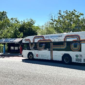 Tinloy Transit Center and Ebus with Bus Stop Shelter in background