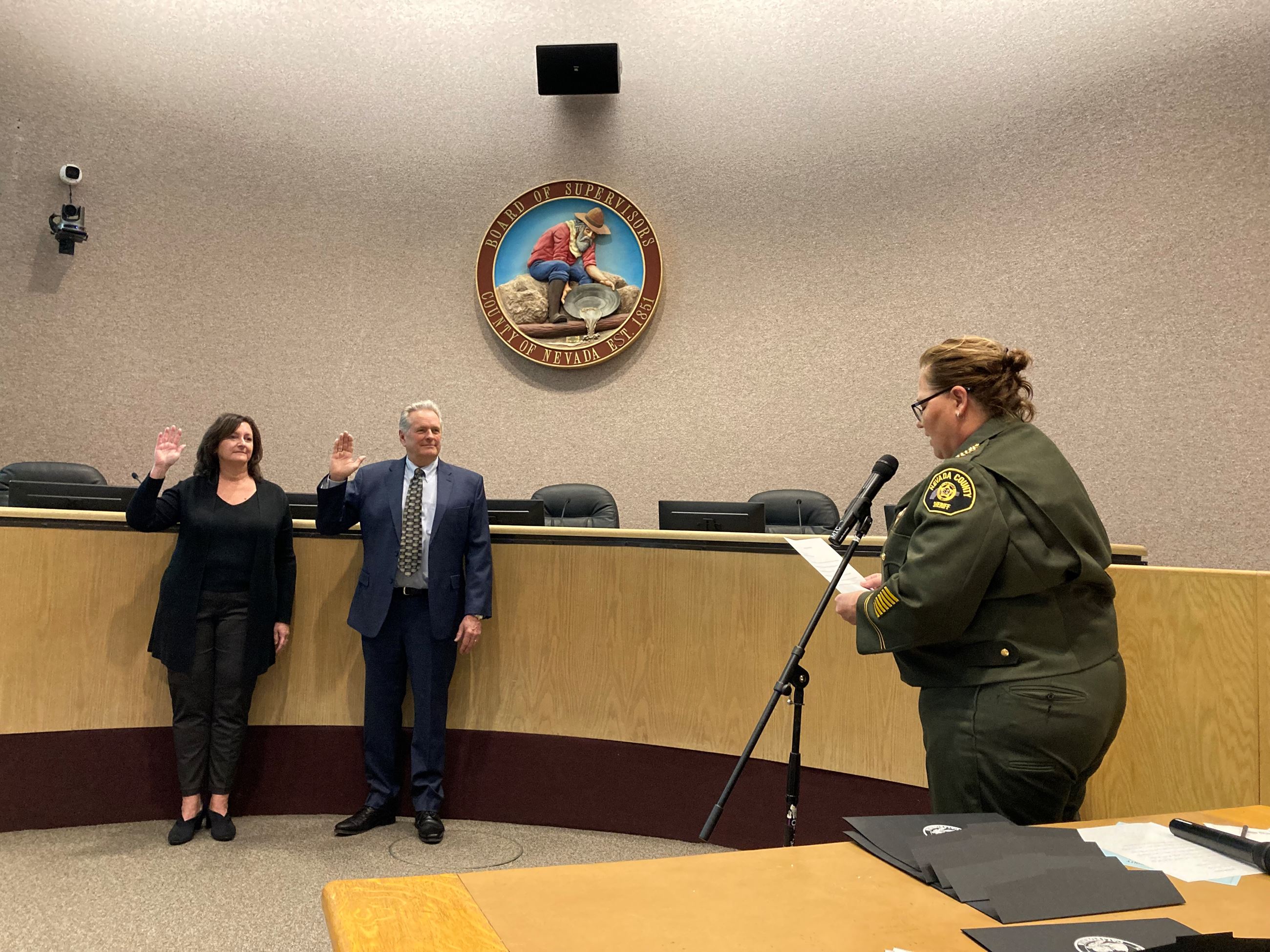 Sheriff Shannan Moon adminsters the Oath of Office to District 3 Supervisor Lisa Swarthout and Asses